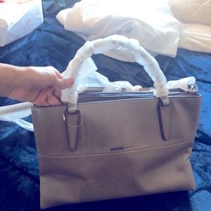 Leather purse by Coach